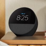 smart alarm clock Echo Spot on nightstand display