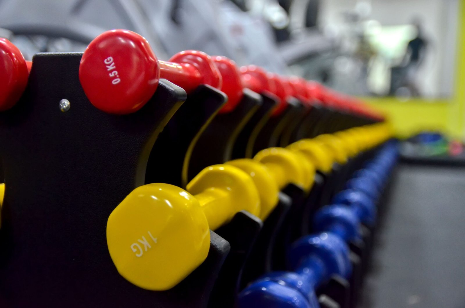 light dumbbells rack color coded weight sizes