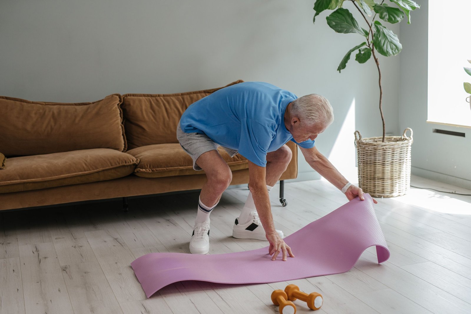 Muscle Loss by Decade: The Surprising Timeline From 30 to 80 1 muscle loss prevention senior man home workout setup